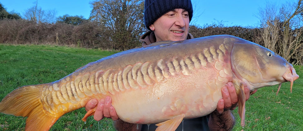 Angler holding a fish