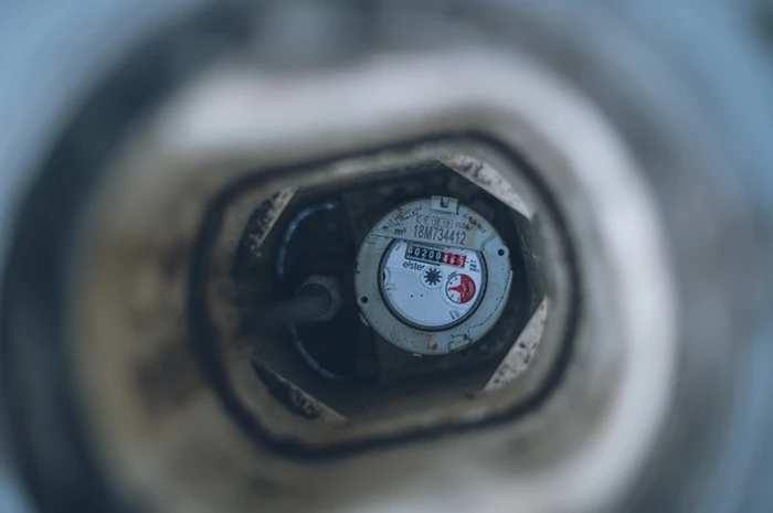 Water meter at bottom of meter chamber