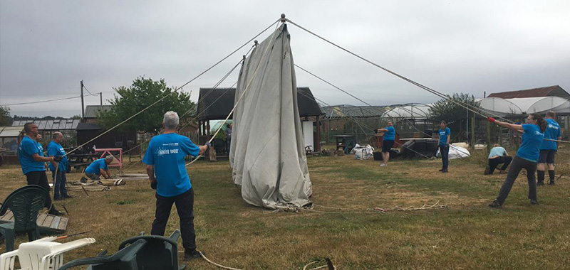 Waterforce volunteers helping erect a tent